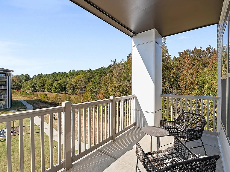 Unwind on your private balcony with serene views of nature.