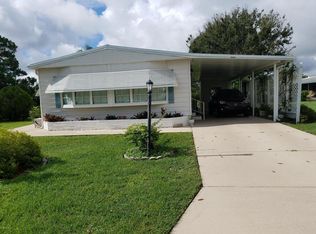 909 Cypress St, Barefoot Bay, FL 32976