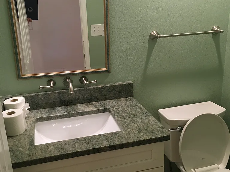 Half bath on main floor off of the kitchen