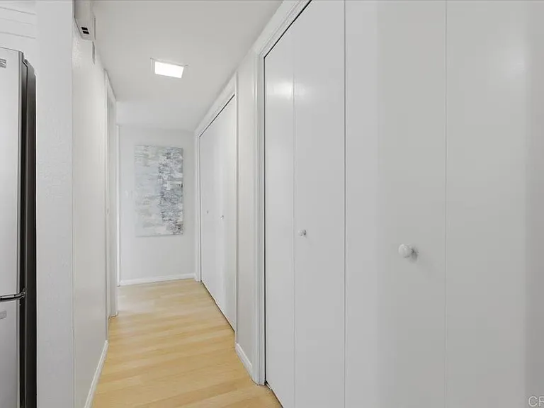 Hallway Closets, looking towards guest bath / bedroom.