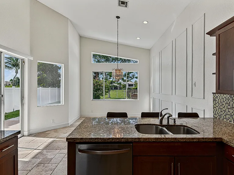 4583 NW 7th Pl — Photo 17