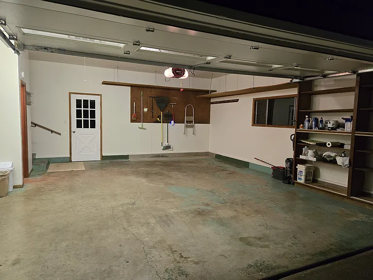Garage with built in storage and washer/ dryer