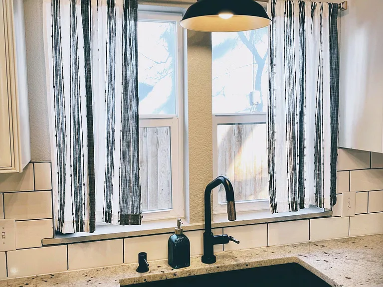 Upgraded granite countertops and touchless faucet