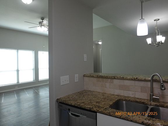 View from the kitchen to family area and dining area.