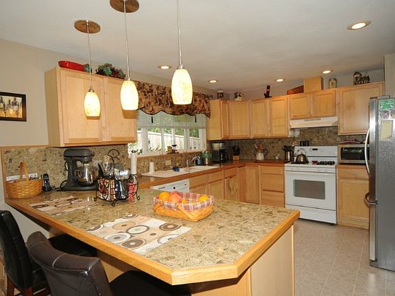 Updated Dated Kitchen with Granite, Breakfast Bar & Lots of Cabinets
