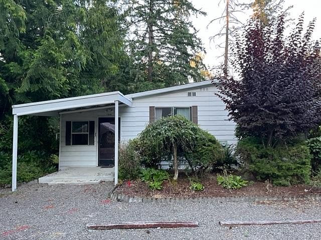 Front of home, 3 parking spots