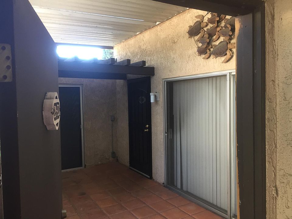 Private atrium with locking door on top of stairs.Security s