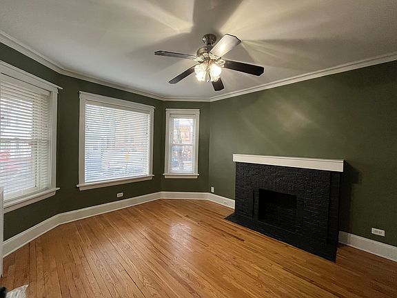 Living room with decorative fireplace