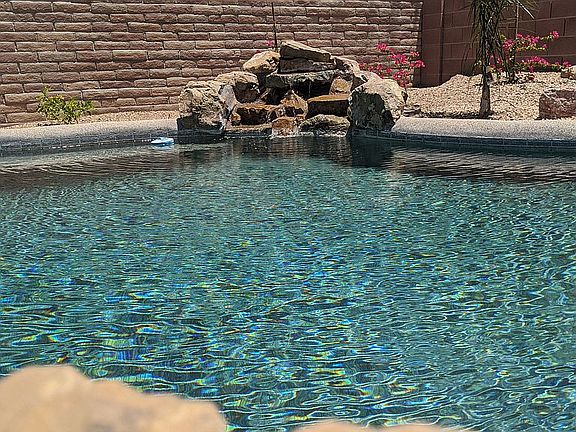 Pool with waterfall