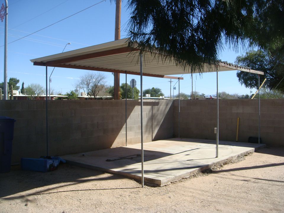 Covered patio in back yard