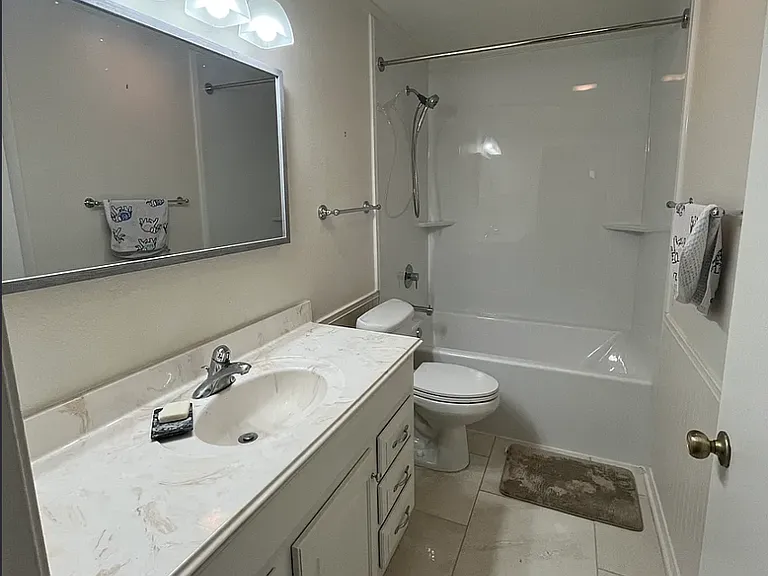 Guest bathroom with a new shower/tub combo