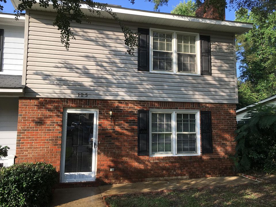 Quiet end unit with off-street parking and private backyard.