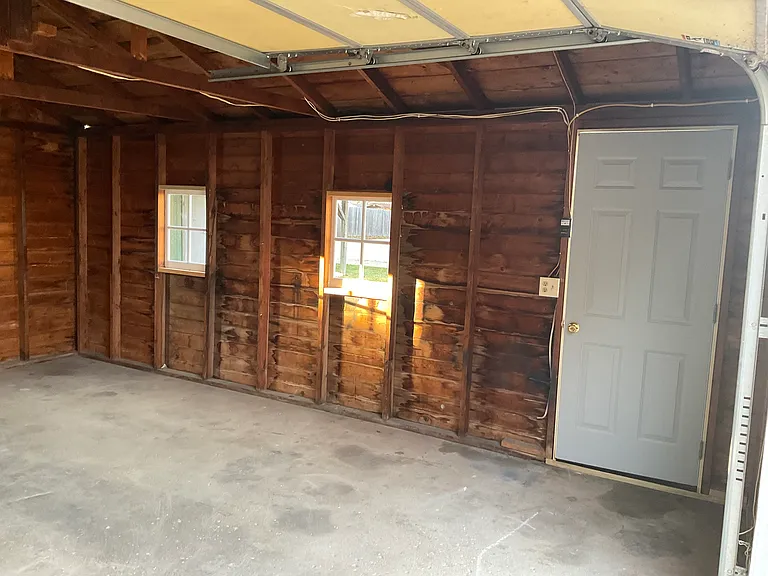 Interior of garage, showing side entrance