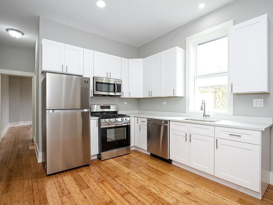 Kitchen with stainless steel appliances.