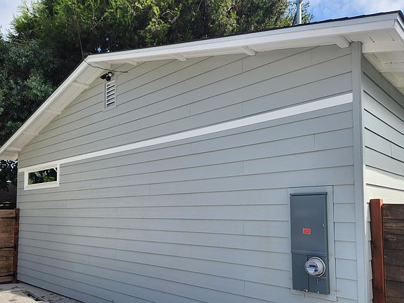 safety motion lighting. can accomodate electrical vehicle. mature pine tree canopy creates shaded yard.