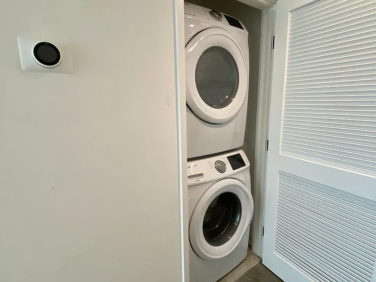Washer and dryer conveniently located in the main hall