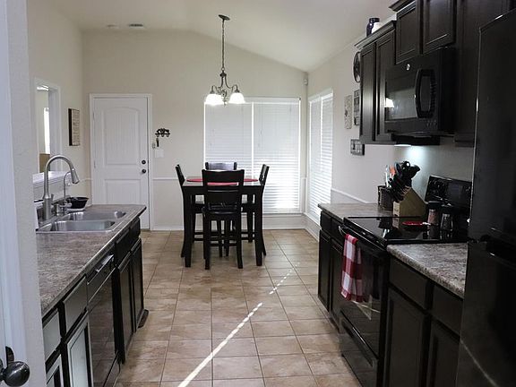 4th image of 9309 Hawthorne Ct