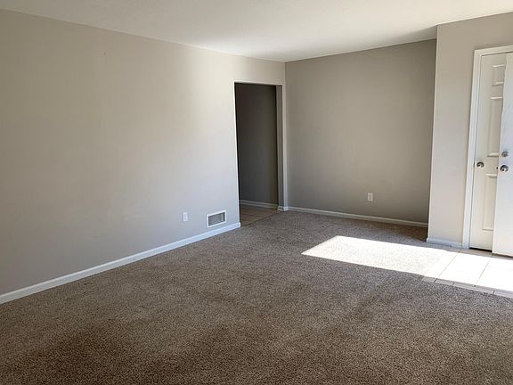 Living room and coat closet