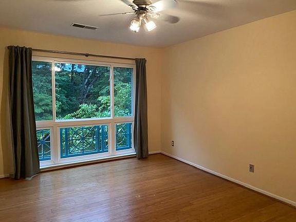 Master bedroom is 10x15 and features walk-in-closet. King bed fits easily, plenty of light.