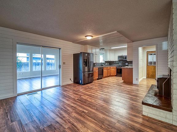 Spacious open floor dining area " White Refrigerator" not shown included.