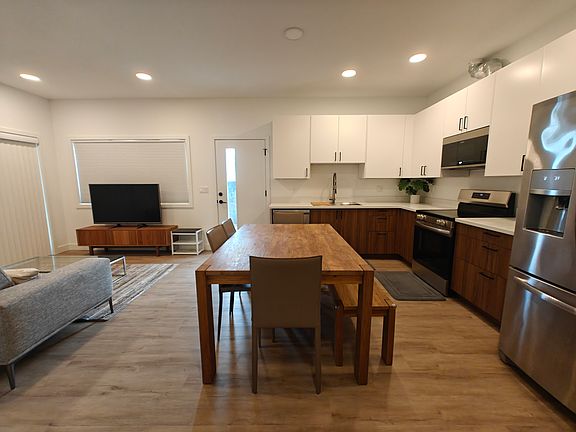 Another view of the kitchen, dining and living room.