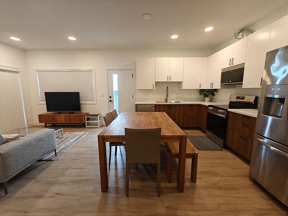 Another view of the kitchen, dining and living room.