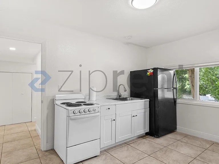 275 NW 81st St — Photo 10