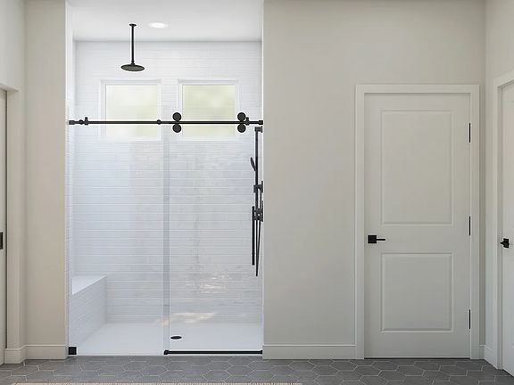 Primary bath with glass shower enclosure