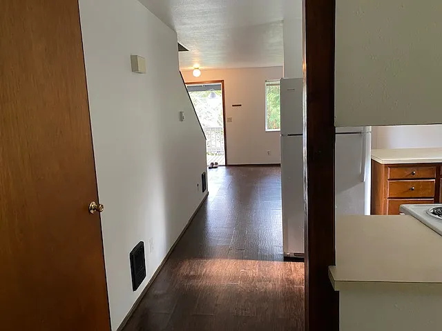 Looking from the dining room to the front door
