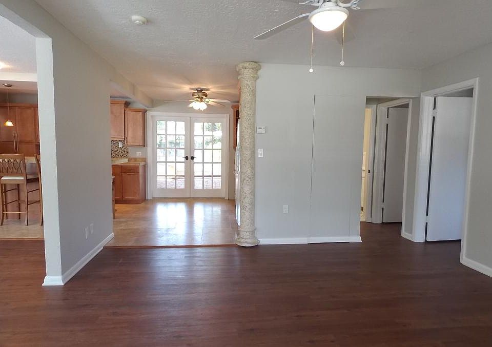 View from front door. Bedrooms & Bathroom on Right. Living r