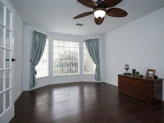 The Study room features french doors, wood flooring and a bay window.  This room could also be used as a Formal Dining or Formal Living Room.