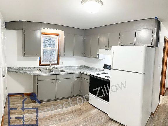 Similar Kitchen, will have more white counter top, window painted white, and all new appliances.