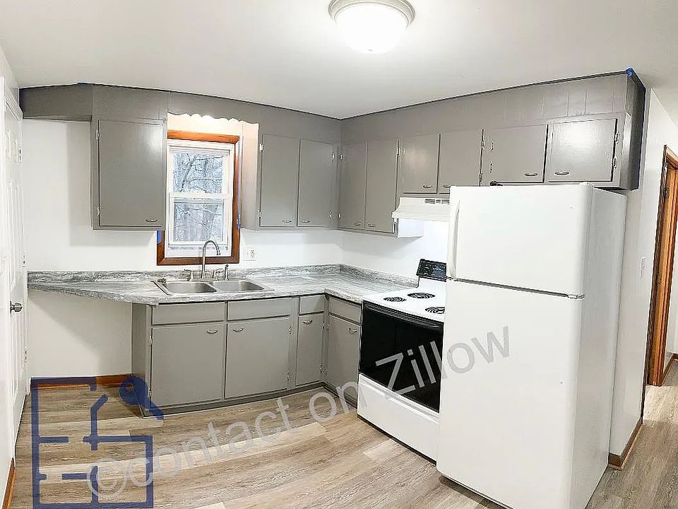 Similar Kitchen, will have more white counter top, window painted white, and all new appliances.
