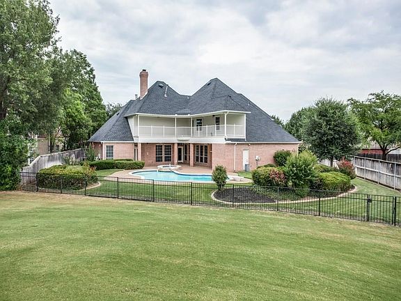 View from the golf course!! large covered patio! Speakers and ceiling fans!