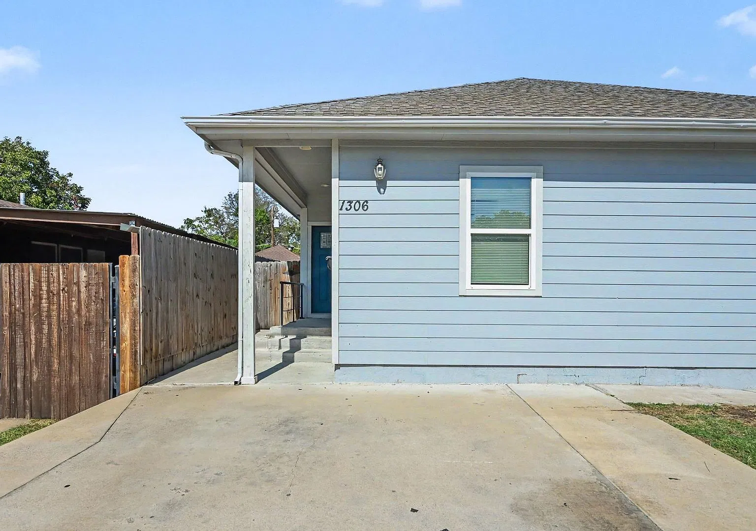 Welcome to this charming home at 1306 Orange Ave, Fort Worth, TX 76110! — Photo 1