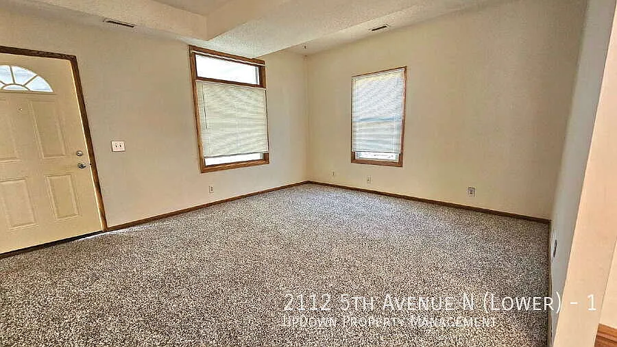 "Charming 3-Bed Unit in the Vibrant Harrison Neighborhood 1200 Sq. Ft. of Modern Comfort!" — Photo 2