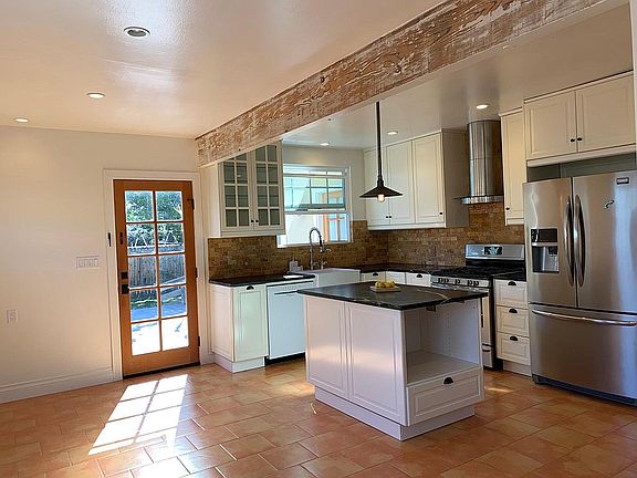 Kitchen with door to deck