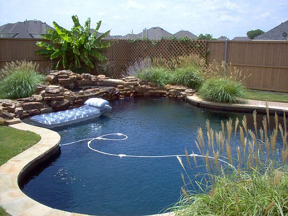 Hot Tub with 7 waterfalls flows into Pool