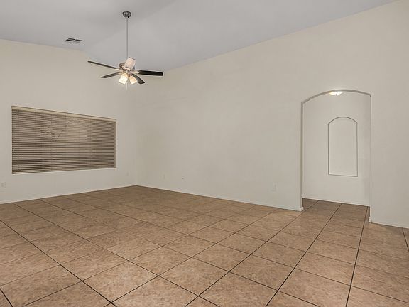 Open floor plan living room - along with a view to the master bedroom