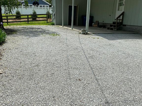 Carport with additional parking for guests