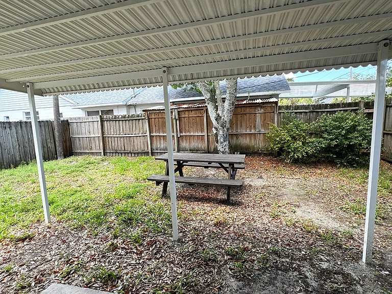 Awning was removed due to hurricane damage. Posts