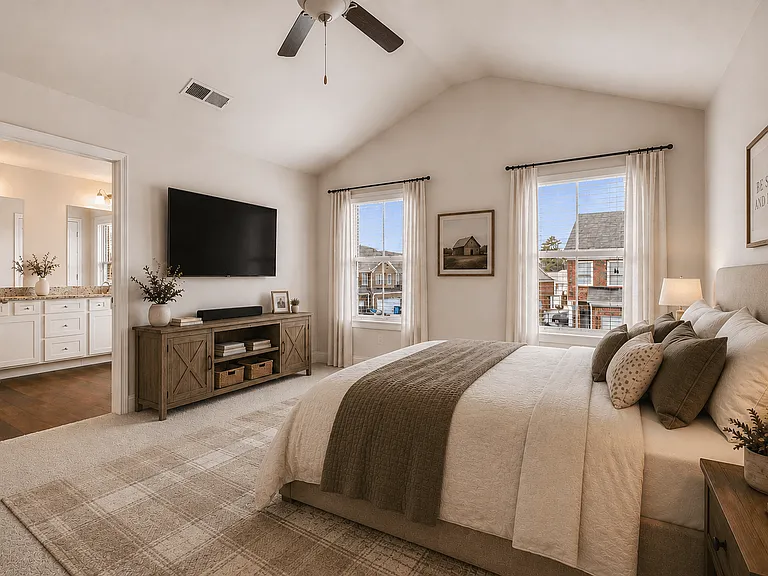Serene primary suite with a plush king bed, refined finishes, and calming greeneryyour private retreat for rest and relaxation.