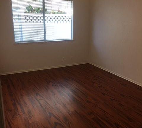 Downstairs bedroom #2, koa patterned vinyl flooring