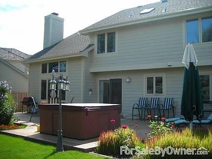 Back view of patio and hot tub