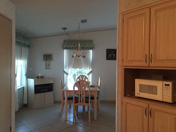 5th image of 1601 441 Se Oasis Vlg #44