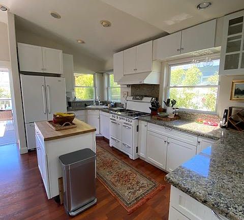 Large open kitchen with lots of counter and cabinet storage space