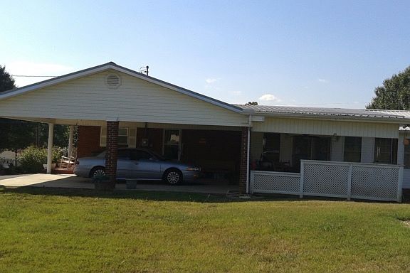 Covered garage & patio side