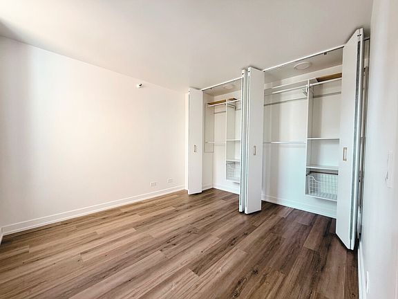 Bedroom with organized closets