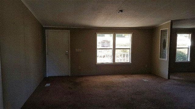 Den looking at front door