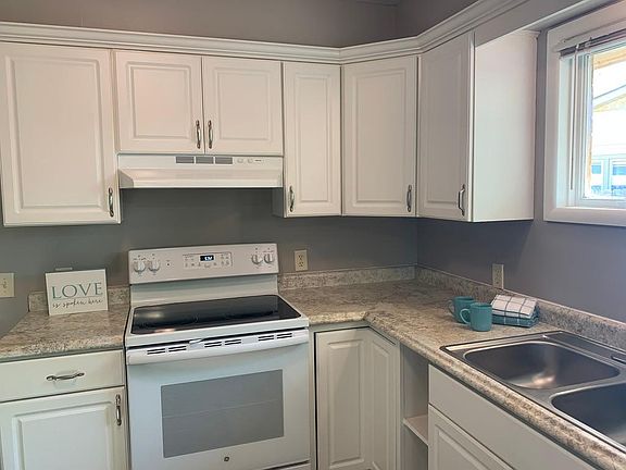 Crown molding added over cabinets